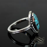 Turquoise surrounded by Dew Drops - Sterling Silver