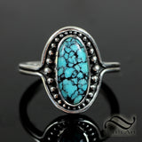 Turquoise surrounded by Dew Drops - Sterling Silver