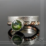 Peridot in Sterling Silver bezel ring with tri metal twist
