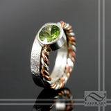 Peridot in Sterling Silver bezel ring with tri metal twist