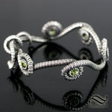 Coiled Serpent Bangle in Sterling Silver with Natural Peridot