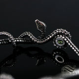 Coiled Serpent Bangle in Sterling Silver with Natural Peridot