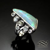 8.3 ct Australian opal Ring with Montana Sapphires