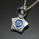 Tiny Moon Star Locket in Sterling Silver
