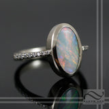 Opal Engagement Ring in 14k white gold with diamonds