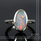 Opal Engagement Ring in 14k white gold with diamonds