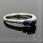 Black Diamond and Sapphire Three Stone Ring - 14k white gold