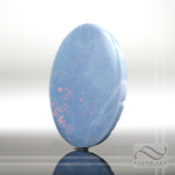 Large Australian Opal with blue base and Red color play